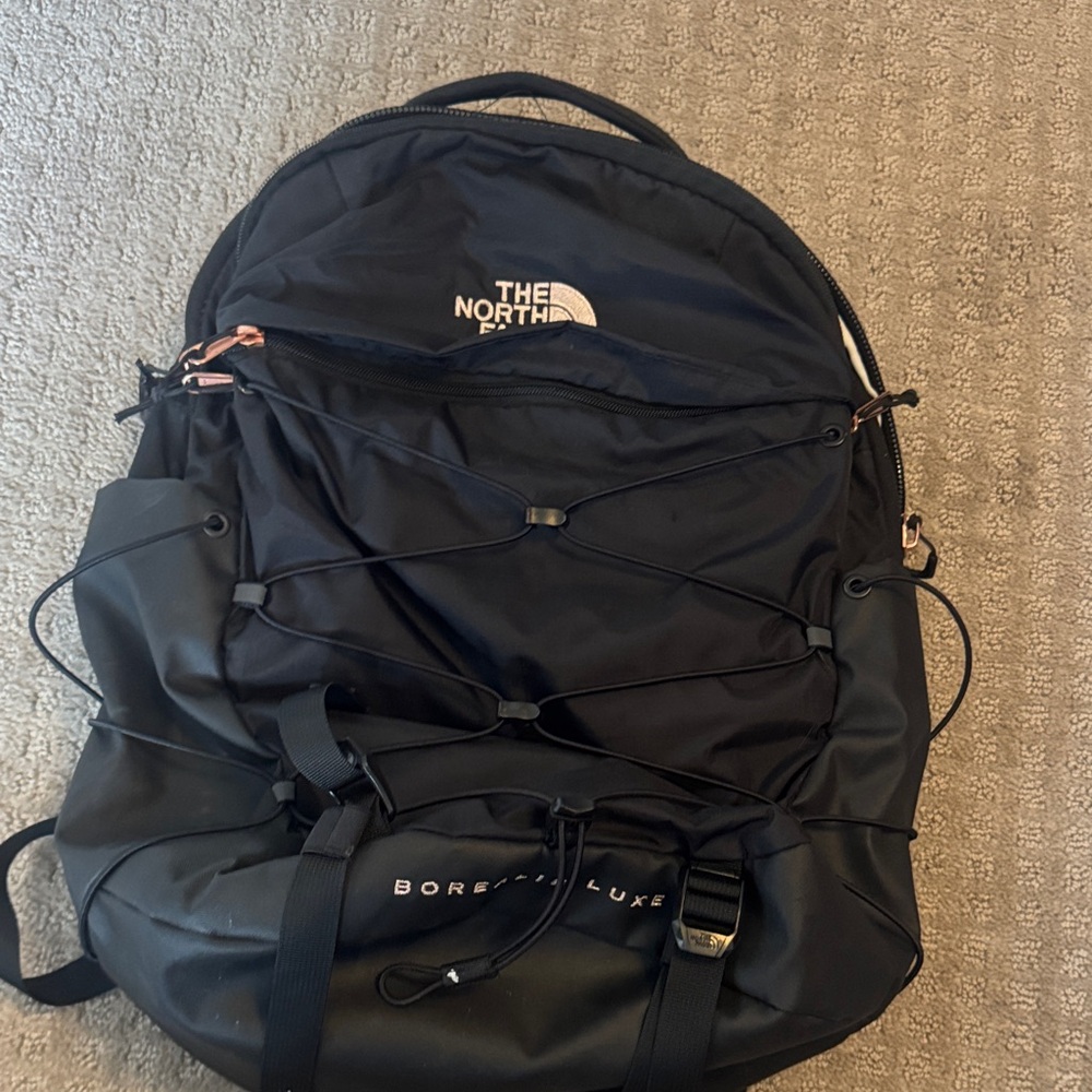 The North Face Black Borealis-Style Backpack with Rose Gold Accents